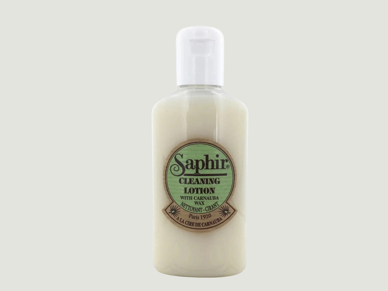 Frasco de Saphir Blue Cleaning Lotion, loción limpiadora de intensidad media para cuero liso. Elimina ceras antiguas sin dañar. Ideal para uso previo a tratamientos.